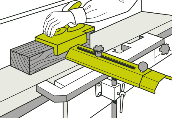 [Image] Hand operating a push block with a short piece of timber