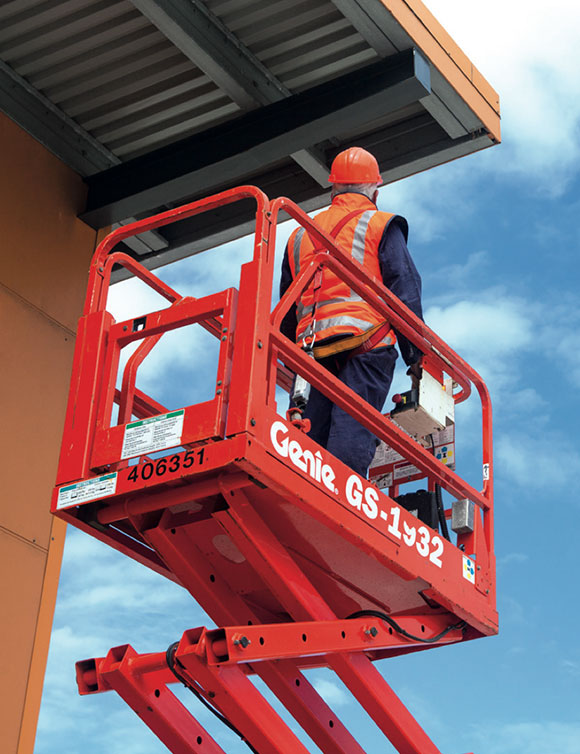 [image] A worker restrained in scissor lift